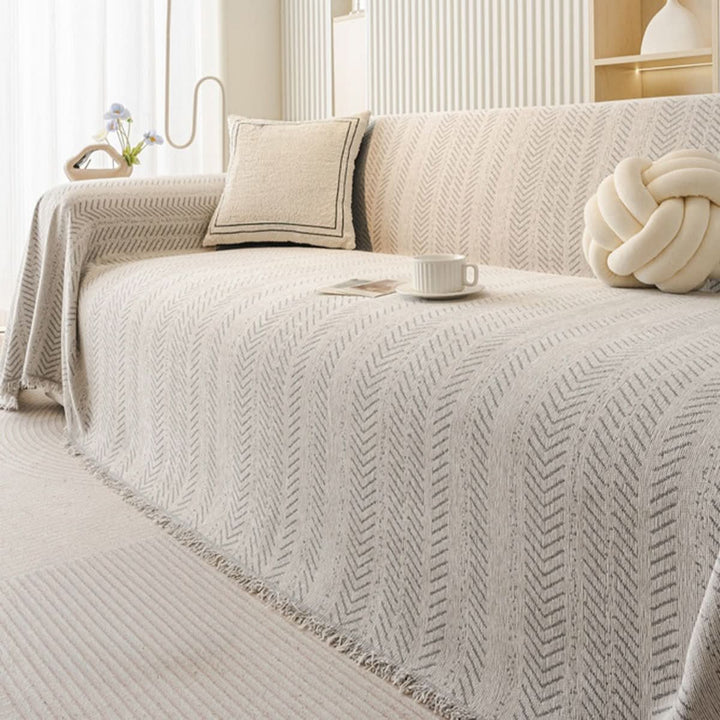 Easy-care, washable chenille sofa cover. This durable slipcover protects your furniture from scratches and everyday wear.