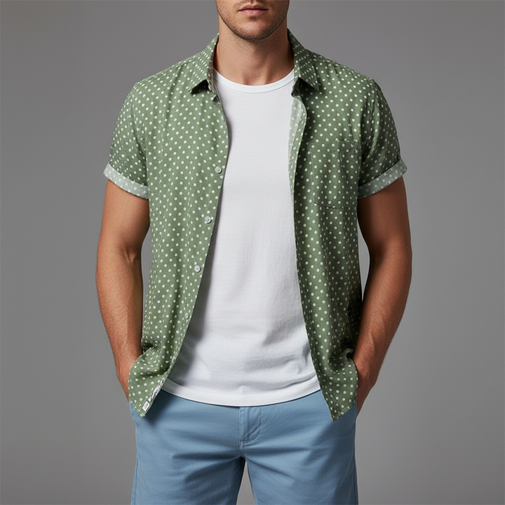 Stylish men's short sleeve polka dot button-up shirt for beach, resort, and summer fashion.
