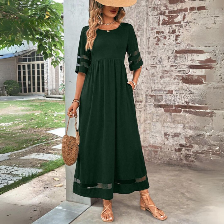Stylish women's maxi dress with elegant mesh paneling & a flattering gathered waist, ideal for spring/fall.