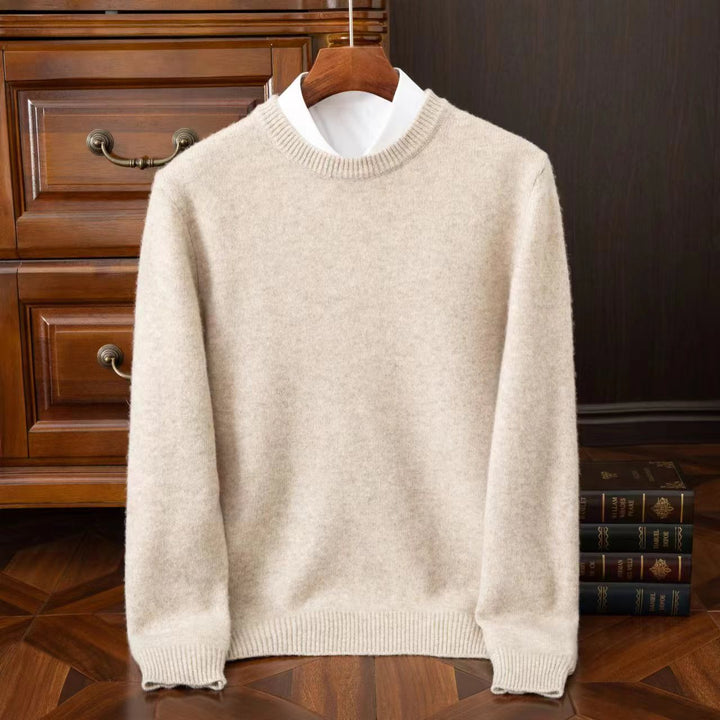 Close-up of the Redmond men's soft knit sweater's refined texture, highlighting its comfortable, high-quality feel.