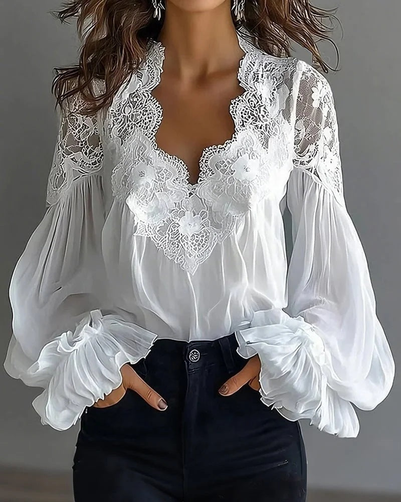 Stylish black V-neck women's blouse featuring sophisticated long puffed ruffle sleeves. Ideal for formal events.