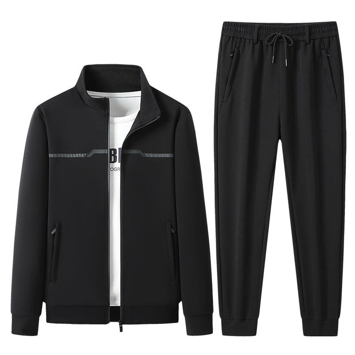 Unisex textured design tracksuit, in deep black, offering supreme comfort & a tailored fit for any activity.