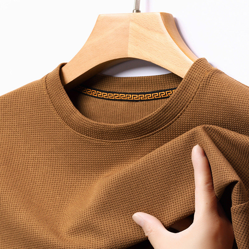 Comfortable men's premium waffle knit tee, a classic textured top for casual everyday apparel.