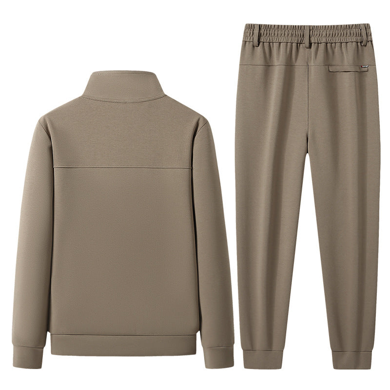 Deep black unisex textured tracksuit set, ideal casual outfit & sportswear. Comfortable, tailored design.