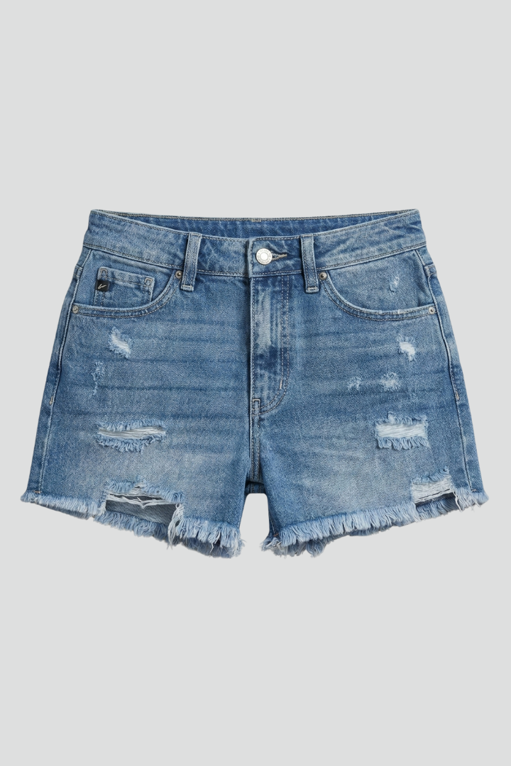 Dark blue women's distressed mid-rise shorts with frayed edges, perfect for casual summer fashion.
