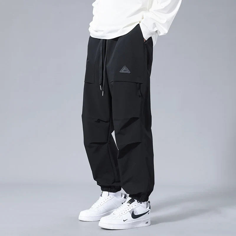 Men's casual joggers with secure zipper pockets. Comfortable activewear & athletic pants, perfect for everyday style.