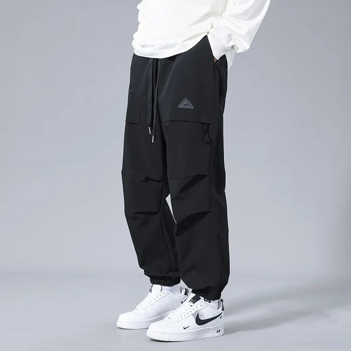 Men's casual joggers with secure zipper pockets. Comfortable activewear & athletic pants, perfect for everyday style.