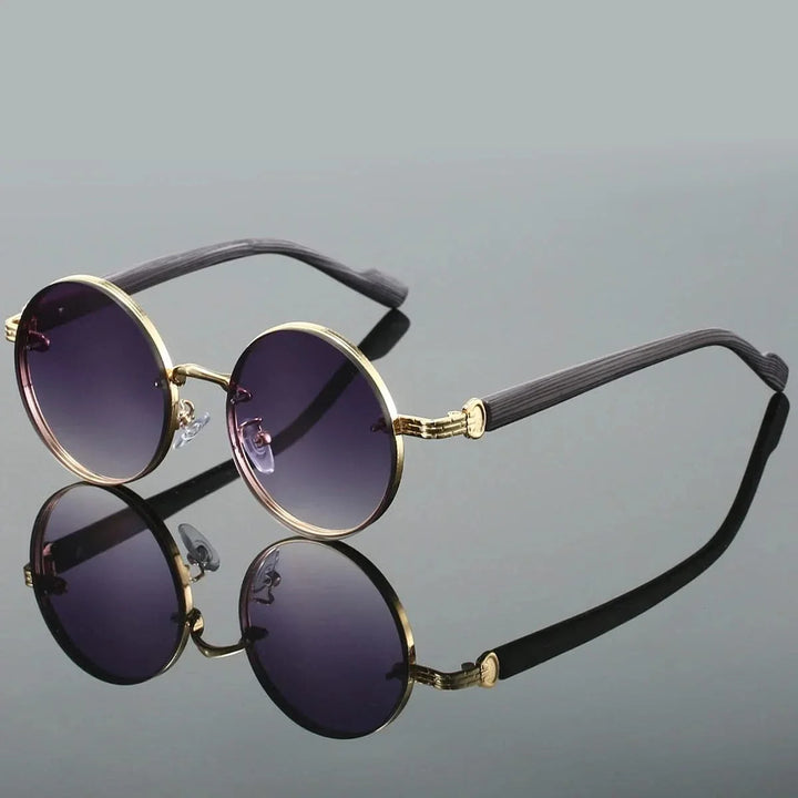Stylish unisex round gradient lens sunglasses with a sleek metal frame, offering UV protection for modern eyewear fashion.