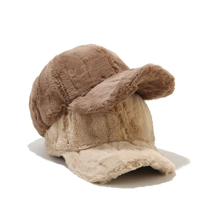 Soft and cozy women's plush faux fur cap, a fashionable winter accessory for ultimate warmth.
