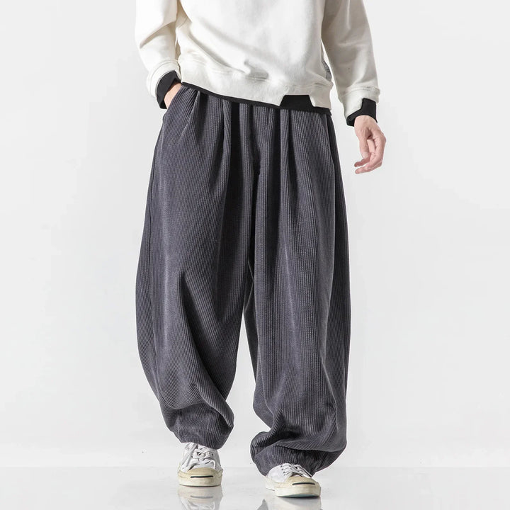 Stylish relaxed fit joggers, unisex design, ideal for streetwear or comfortable loungewear.