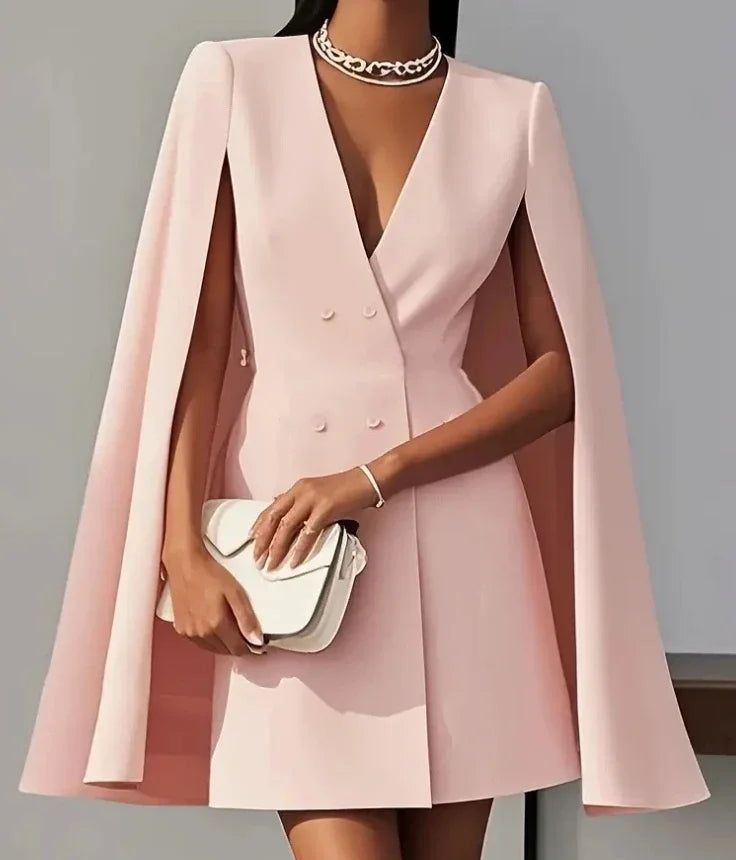 Women's elegant V-neck blazer dress featuring unique flowing cape sleeves. A chic mini dress for formal occasions.
