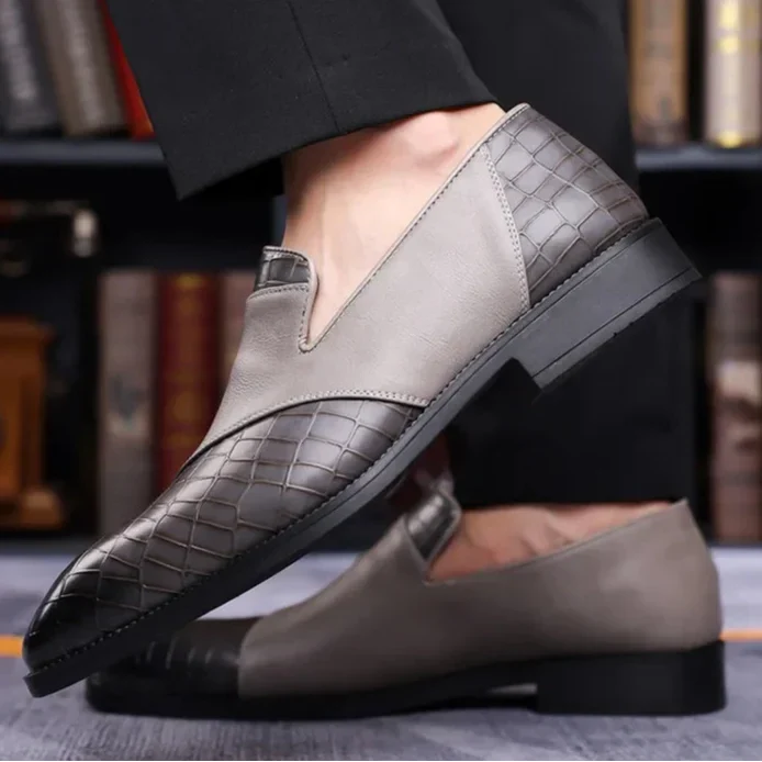 Stylish back detail of men's classic slip-on loafers, providing a secure yet comfortable fit.