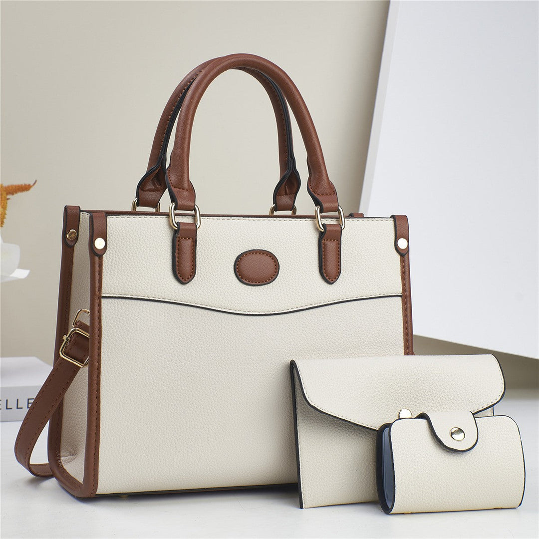 Verona Trio vegan leather handbag set. Detailed view of spacious tote, shoulder bag, & wallet compartments.