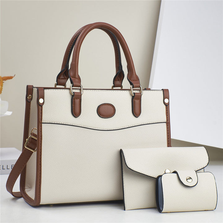 Verona Trio vegan leather handbag set. Detailed view of spacious tote, shoulder bag, & wallet compartments.