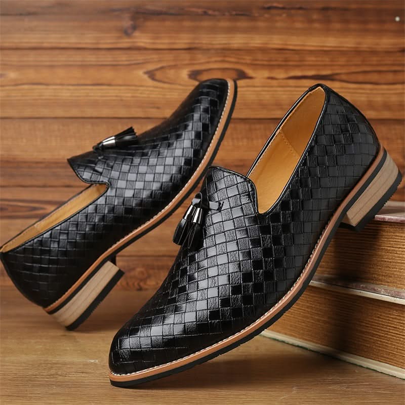 Stylish men's dress loafers with intricate woven texture and classic tassels. Durable men's fashion.