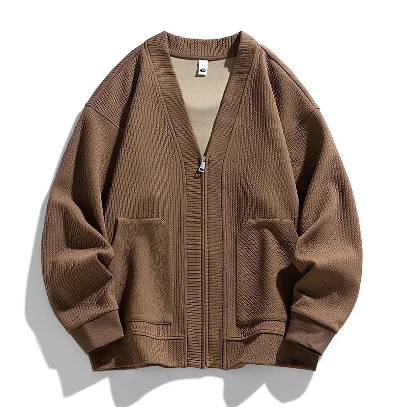 Men's relaxed fit brown zip-up sweater with pockets, ideal for casual layering & comfort. Full zip outerwear.