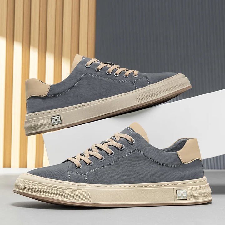 Stylish blue men's lightweight sneakers, perfect for walking & everyday comfortable wear.