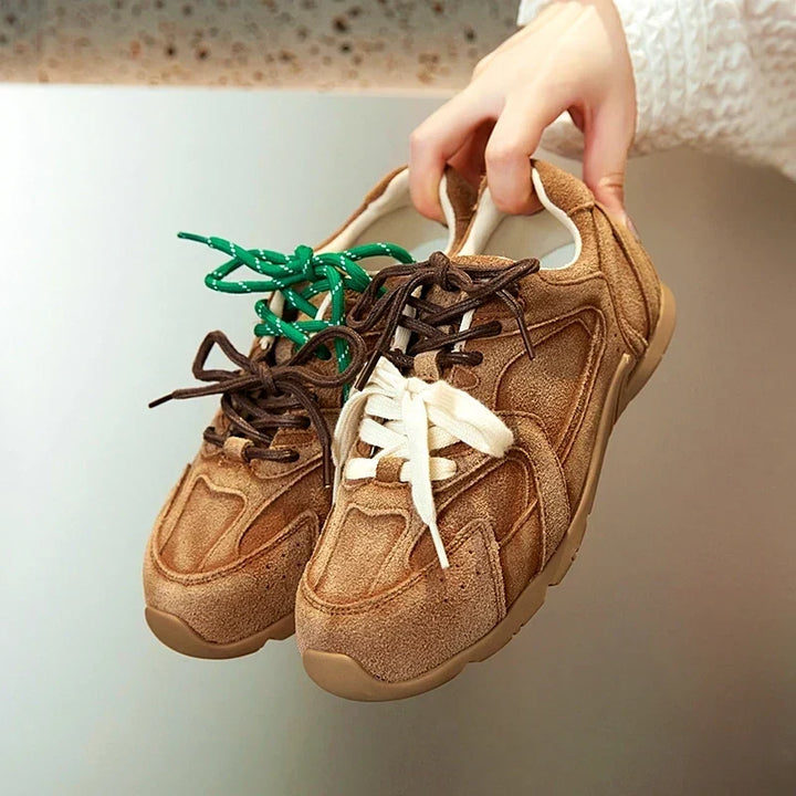 Stylish men's sneakers featuring unique double lace design, perfect casual footwear for modern men.