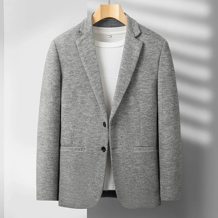Men's structured blazer, tailored for elegant style & comfort. Perfect for formal or smart casual outfits.