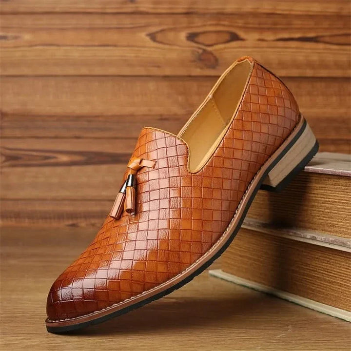 Men's formal footwear: Woven tassel dress loafers. Easy slip-on style, perfect for sophisticated men's fashion.