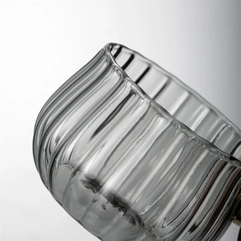High-quality borosilicate glass mug, featuring a comfortable handle for a superior drinking experience.