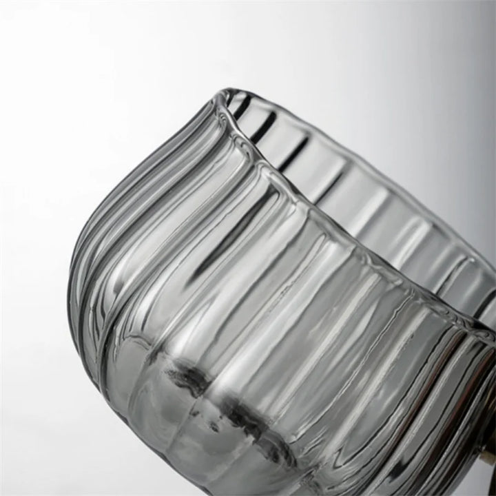 High-quality borosilicate glass mug, featuring a comfortable handle for a superior drinking experience.