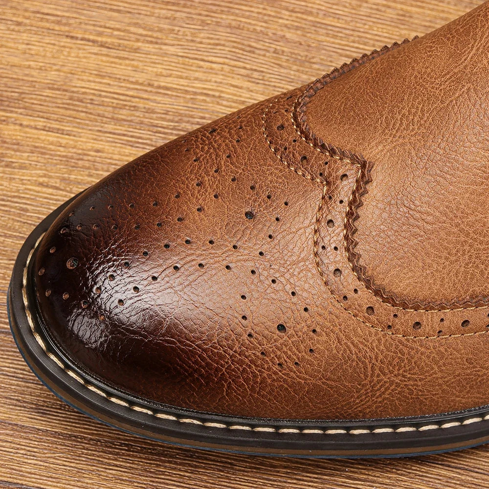 High-quality men's dress boots, featuring soft cushioning, classic Chelsea style, and a striking blue sole.