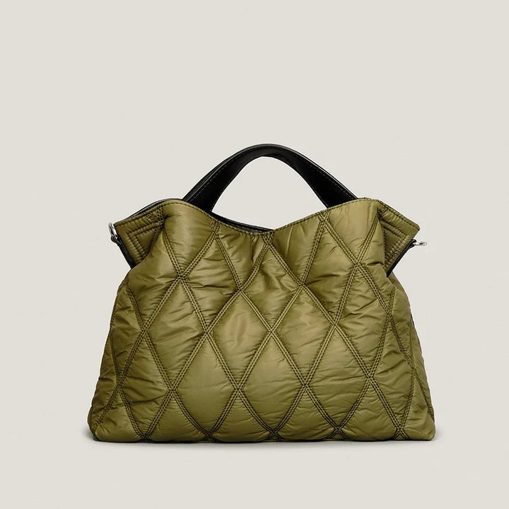 Stylish green quilted women's tote bag, plush comfort & spacious design. Ideal everyday carry shoulder bag.