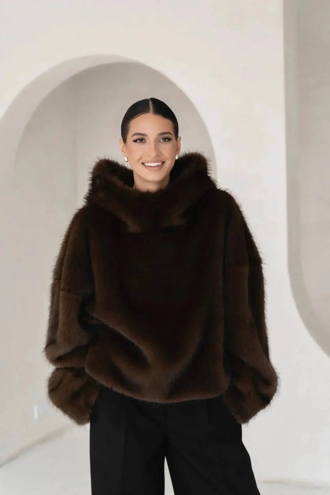 Stylish women's oversized plush hoodie pullover, ideal for fall & winter warmth. Ultra-soft casual comfort apparel.