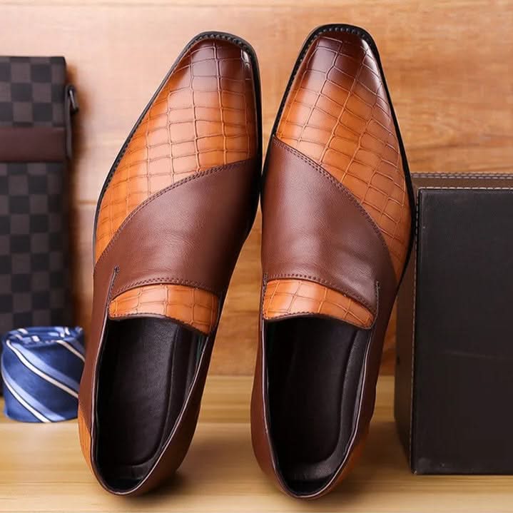 Comfortable men's dress loafers in a classic slip-on design, ideal for casual or office wear.