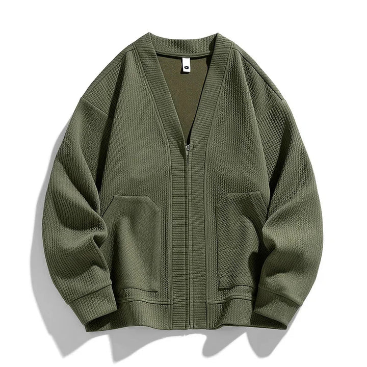 Green men's relaxed fit zip-up sweater, casual and comfortable for everyday wear. Perfect layering piece.