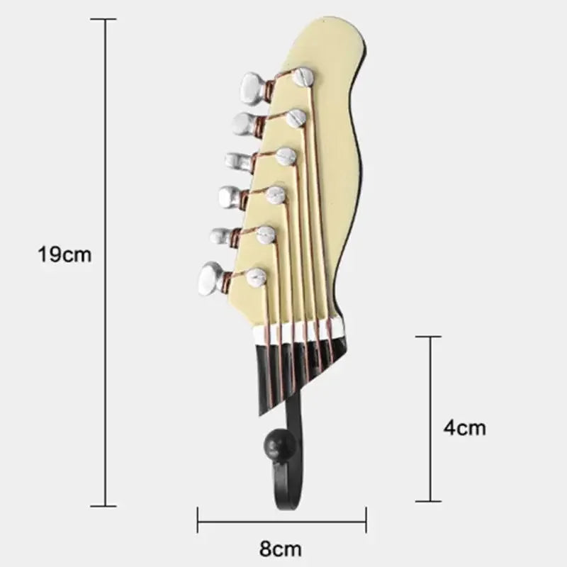 Decorative set of 3 guitar-shaped wall hooks. Ideal for entryway organization, key holding, or unique home decor.