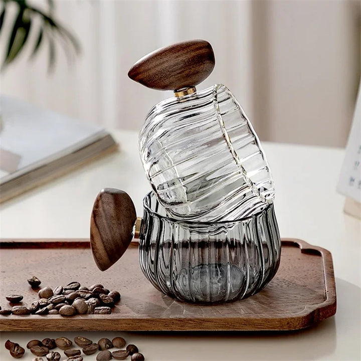 Transparent glass mug made from borosilicate, designed for enjoying all types of hot and cold drinks.