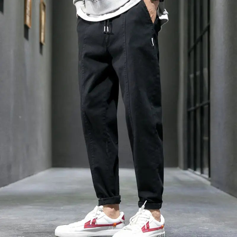 Men's tapered joggers in black, offering ultimate comfort for casual, athletic & loungewear needs.