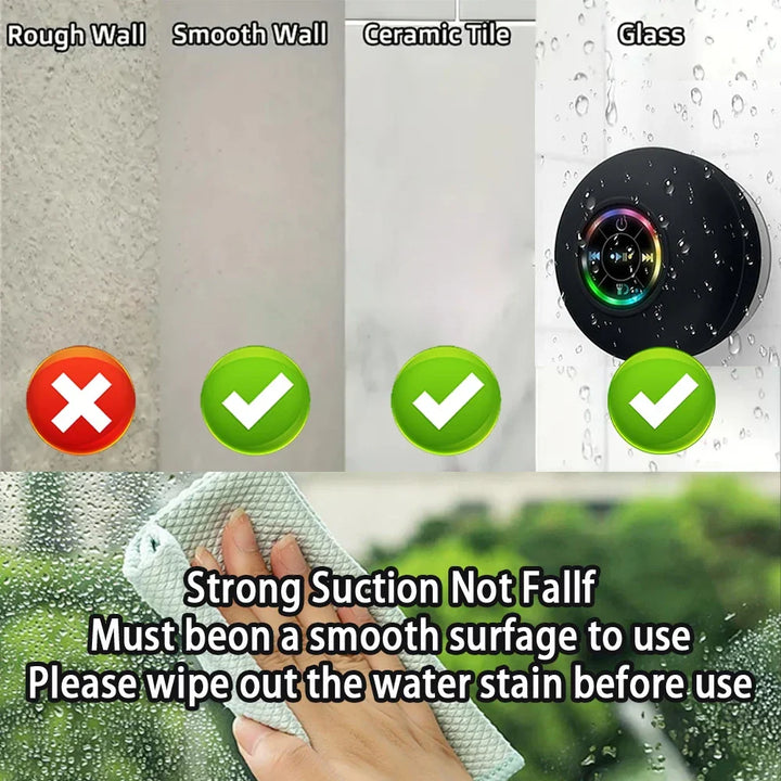 Wireless audio speaker, black & portable, with bright LED, suction mount for shower, outdoor, and travel.