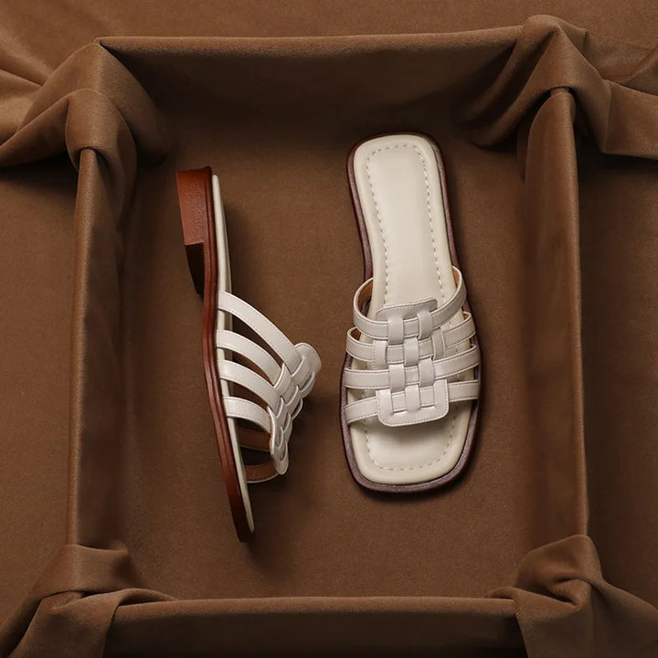 Comfortable Women's Tivra slide sandals, cushioned, geo cutout, perfect open-toe summer shoes for casual style.