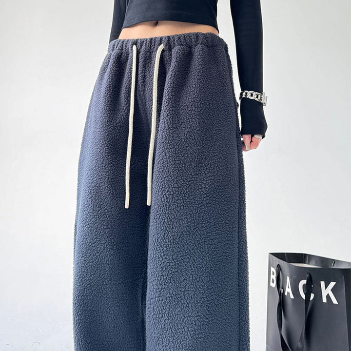 Soft comfort pants, unisex design. Ideal for lounging or casual activewear with practical pockets.