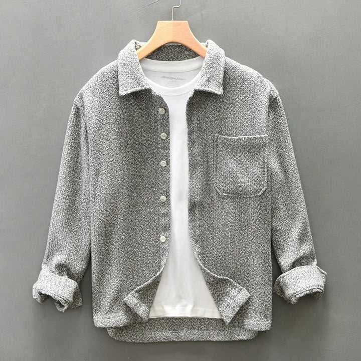 Stylish men's gray knitted button-down shirt, a cozy boucle top for fashionable casual wear.