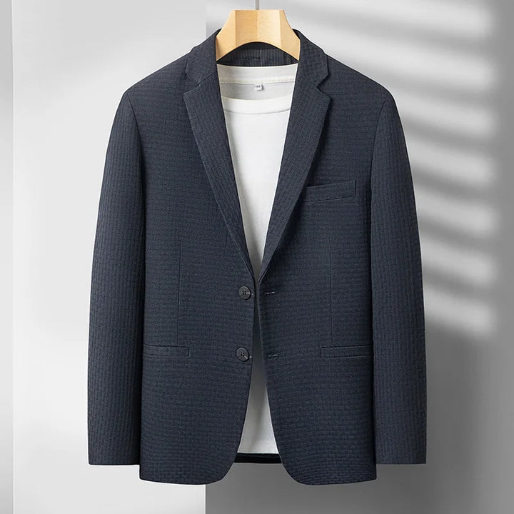 Classic men's blue structured blazer, offering sophisticated style and comfortable, tailored fit.