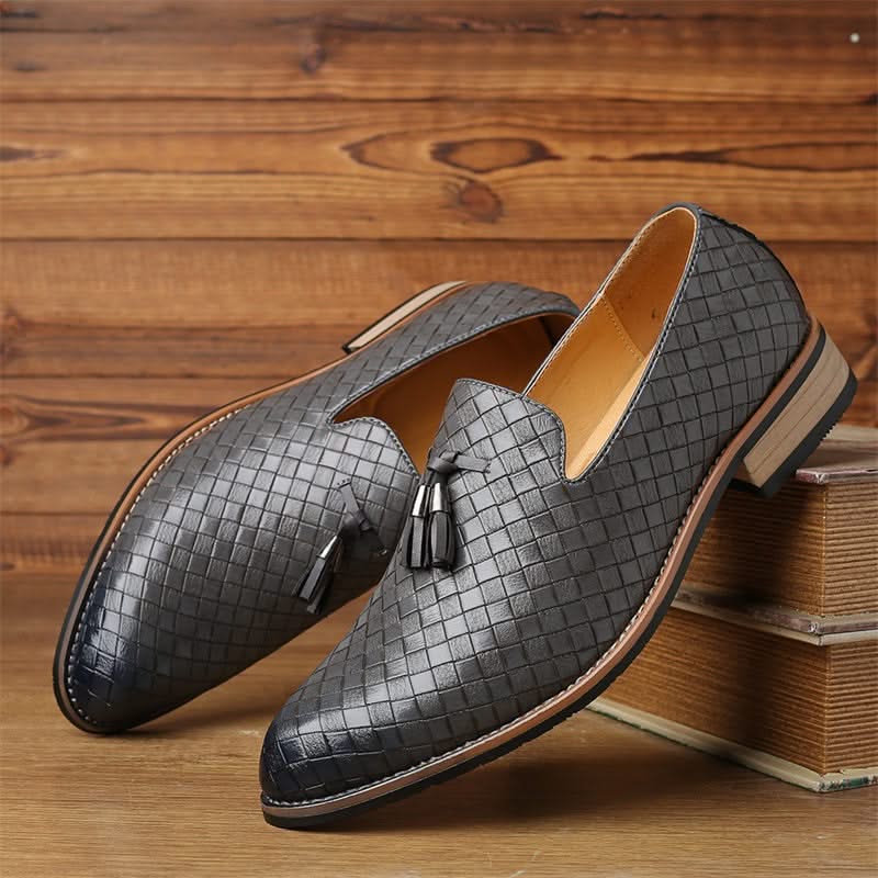 Durable men's woven loafers, featuring elegant tassels and a comfortable slip-on design. Formal footwear.