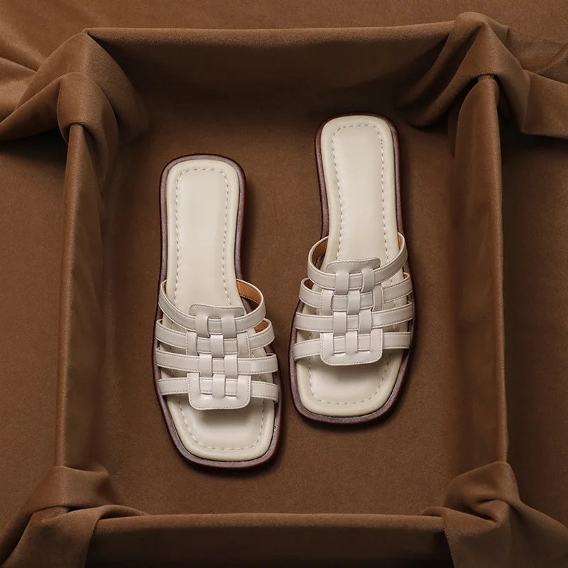 Fashionable Women's Tivra slide sandals, geo cutout, cushioned comfort, ideal for casual summer outfits.