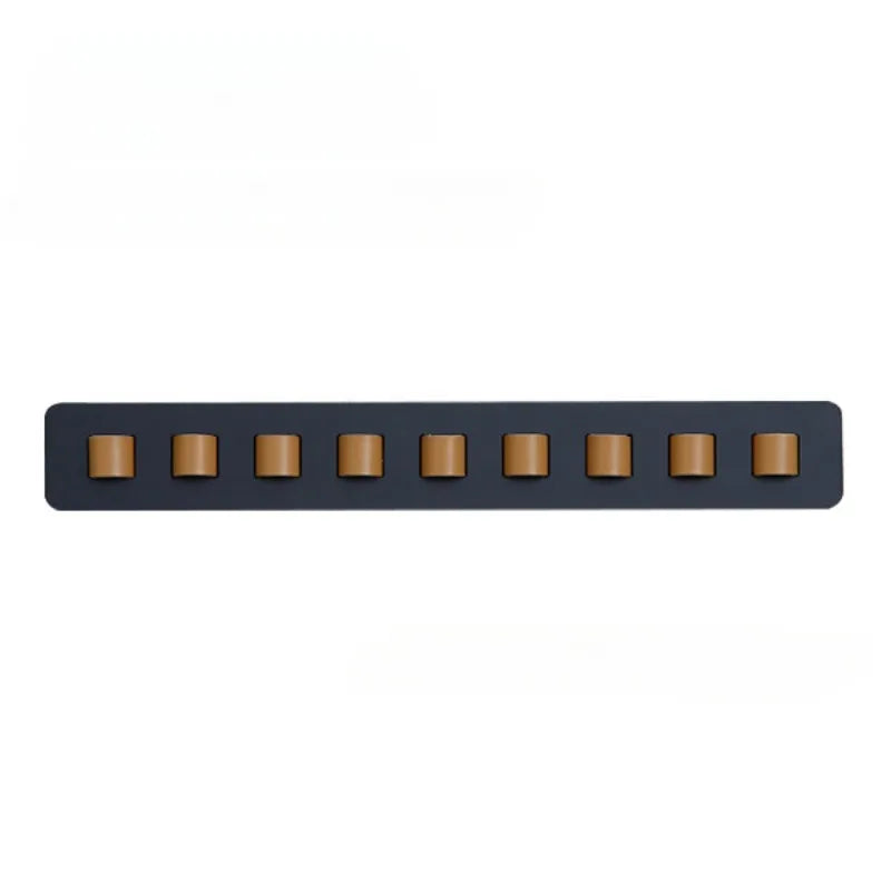Space-saving wooden wall display rack, a sleek organizer for sunglasses & eyeglasses, with leather hangers.