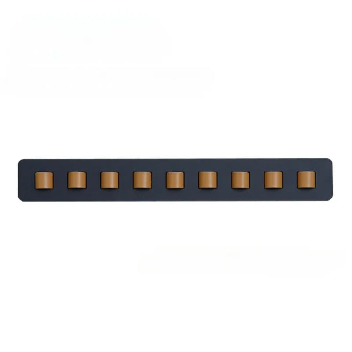 Space-saving wooden wall display rack, a sleek organizer for sunglasses & eyeglasses, with leather hangers.