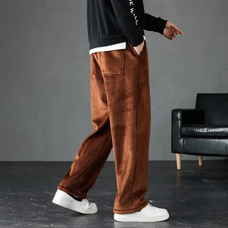 Stylish men's corduroy joggers with soft fabric and elastic waist for casual fashion & comfort.