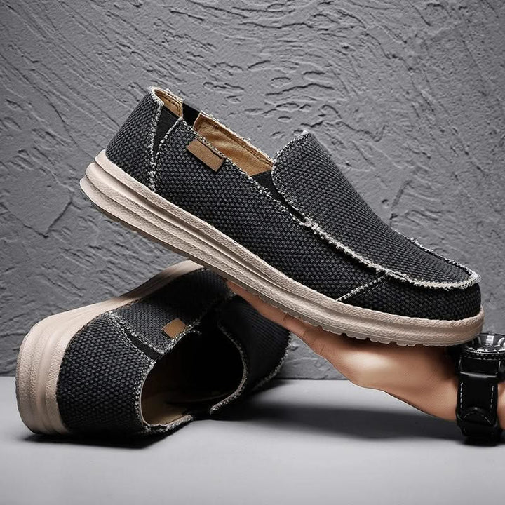 Easy slip-on men's classic loafers, offering timeless mariner style and lightweight comfort for daily use.