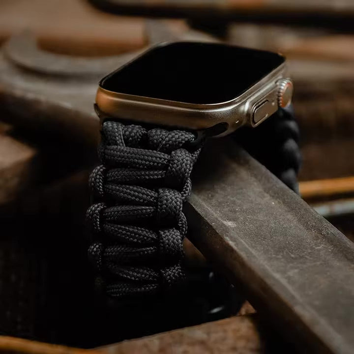 Braided Apple Watch strap for unisex wear, featuring a rugged, durable texture and comfortable adjustable fit.