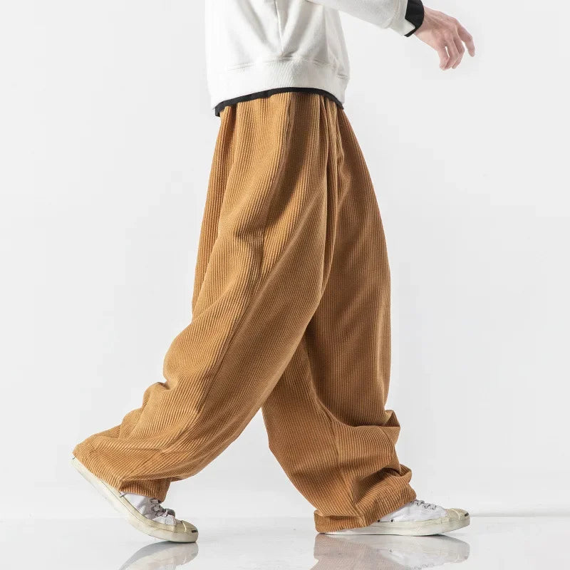 Comfortable relaxed fit unisex sweatpants with an adjustable drawstring waist and side pockets.