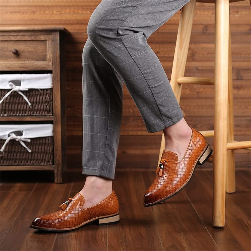 Elegant men's woven tassel loafers, offering a blend of formal style and casual smart comfort. Slip-on design.