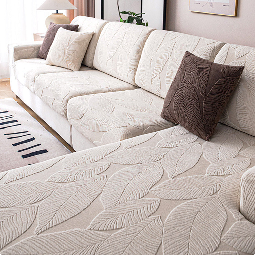 Durable jacquard sofa cover with modern leaf pattern. Easy care, water-repellent, anti-scratch protector.