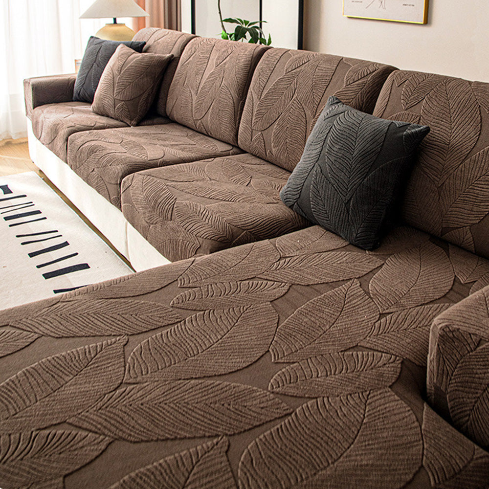 Pet-friendly, waterproof jacquard leaf print sofa cover. Stretch slipcover protects furniture from stains & daily wear.